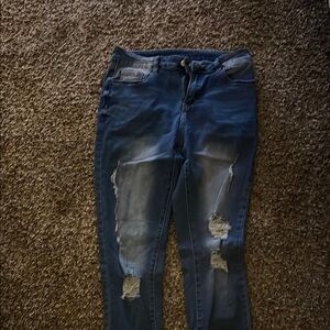Distressed Blue Denim Jeans